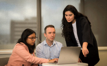 women and man with laptop